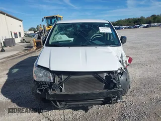 2019 Dodge Grand Caravan SE with VIN 2C7WDGBG7KR803126, listed as a IAAI auction lot 40835937 with 63,100 mi miles and . Bid and sale history available at DreamBid. Image 13.