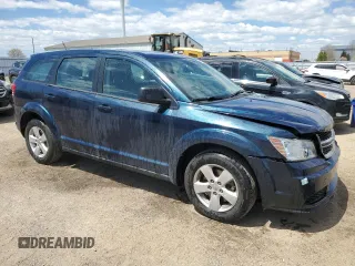 2013 Dodge Journey SE z VIN 3C4PDCAB3DT505527, wystawiony jako Copart lot #56102425 z przebiegiem 217 130 mil mil oraz Szkoda całkowita • Salvage title. Historia ofert i sprzedaży dostępna na DreamBid. Obrazek 4.