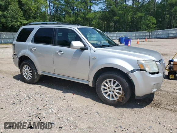 2009 Mercury Mariner Premier z VIN 4M2CU87G19KJ14006, wystawiony jako Copart lot #63615445 z przebiegiem 216 941 mil mil oraz Szkoda całkowita • Salvage title. Historia ofert i sprzedaży dostępna na DreamBid. Obrazek 4.