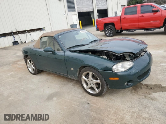 2001 Mazda MX-5 Miata z VIN JM1NB353810212392, wystawiony jako Copart lot #44398295 z przebiegiem 88 601 mil mil oraz Szkoda całkowita • Salvage title. Historia ofert i sprzedaży dostępna na DreamBid. Obrazek 4.