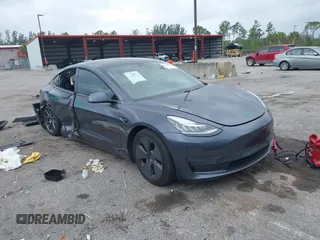 2021 Tesla Model 3 Long Range with VIN 5YJ3E1EBXMF836789, listed as a IAAI auction lot 41900027 with 71,086 mi miles. Bid and sale history available at carsss.com. Image 1.