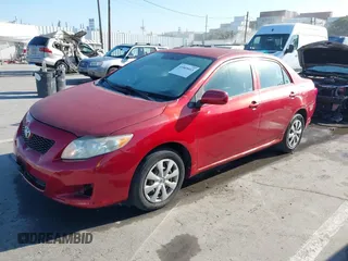 2009 Toyota Corolla with VIN JTDBL40E199074474, listed as a IAAI auction lot 41869413 with 264,873 mi miles. Bid and sale history available at carsss.com. Image 2.