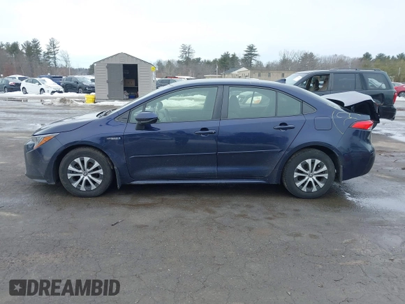 2021 Toyota Corolla Hybrid LE with VIN JTDEAMDE2MJ030035, listed as a IAAI auction lot 41644662 with 130,693 mi miles. Bid and sale history available at carsss.com. Image 14.