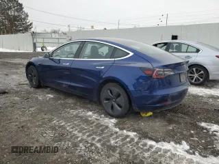 2020 Tesla Model 3 Standard Range Plus with VIN 5YJ3E1EA5LF625456, listed as a Copart auction lot 80926294 with 118,358 mi miles and Salvage Title. Bid and sale history available at DreamBid. Image 2.