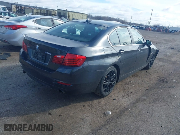 2014 BMW 5 Series 535i xDrive with VIN WBA5B3C52ED534784, listed as a IAAI auction lot 41875567 with 128,533 mi miles and . Bid and sale history available at carsss.com. Image 4.