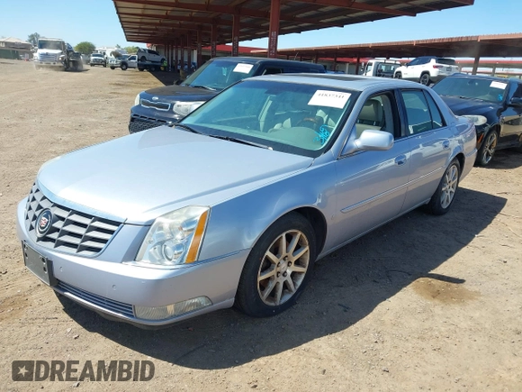 2006 Cadillac DTS w/1SE with VIN 1G6KD57956U188369, listed as a IAAI auction lot 41837341 with 115,417 mi miles. Bid and sale history available at carsss.com. Image 2.