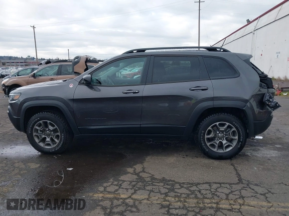 2022 Jeep Cherokee Trailhawk with VIN 1C4PJMBX6ND505196, listed as a IAAI auction lot 41536316 with 9,976 mi miles. Bid and sale history available at carsss.com. Image 14.