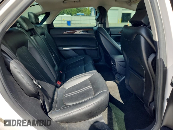 2016 Lincoln MKZ z VIN 3LN6L2G90GR616997, wystawiony jako Copart lot #62917525 z przebiegiem 194 744 mil mil oraz Szkoda całkowita • Salvage title. Historia ofert i sprzedaży dostępna na DreamBid. Obrazek 10.