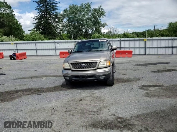 2001 Ford F-150 XLT z VIN 1FTRW08L71KB33686, wystawiony jako Copart lot #58133455 z przebiegiem 248 370 mil mil oraz Szkoda całkowita • Salvage title. Historia ofert i sprzedaży dostępna na DreamBid. Obrazek 13.