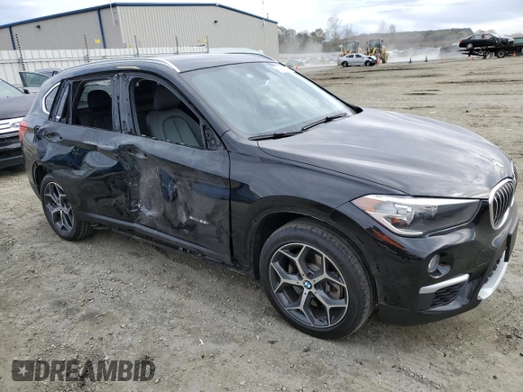 2017 BMW X1 xDrive28i with VIN WBXHT3C37H5F76447, listed as a Copart auction lot 67991792 with 84,189 mi miles. Bid and sale history available at carsss.com. Image 4.