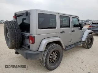 2014 Jeep Wrangler Unlimited Rubicon с VIN 1C4HJWFG3EL322449, выставлен на аукционе Copart как лот 57187665 с пробегом 122 469 миль миль и Списание • Salvage title. История ставок и продаж доступна на DreamBid. Изображение 3.