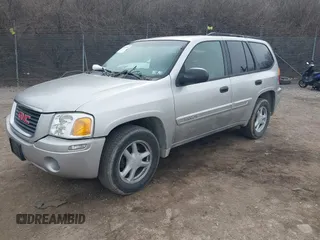 2004 GMC Envoy SLE with VIN 1GKDT13S142219365, listed as a IAAI auction lot 41612594 with 72,292 mi miles. Bid and sale history available at carsss.com. Image 2.