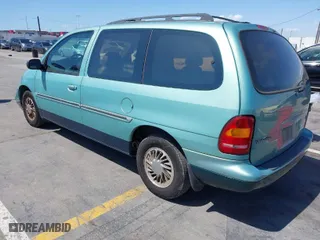 1998 Ford Windstar Wagon GL with VIN 2FMDA5140WBB42090, listed as a IAAI auction lot 41973304 with 68,809 mi miles. Bid and sale history available at carsss.com. Image 3.