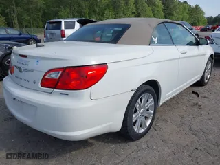 2010 Chrysler Sebring Touring with VIN 1C3BC5ED5AN105022, listed as a IAAI auction lot 42048657 with 188,920 mi miles. Bid and sale history available at carsss.com. Image 4.