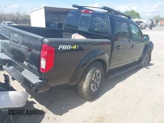2014 Nissan Frontier SV with VIN 1N6AD0EV0EN758585, listed as a IAAI auction lot 41943169 with 186,214 mi miles and . Bid and sale history available at DreamBid. Image 4.