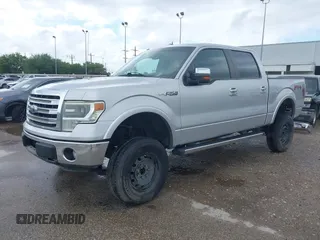 2014 Ford F-150 XL with VIN 1FTFW1CF3EKG10288, listed as a IAAI auction lot 42086251 with 194,220 mi miles and . Bid and sale history available at DreamBid. Image 2.