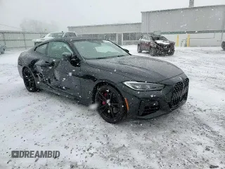 2021 BMW 4 Series M440i xDrive with VIN WBA13AR0XMCG68638, listed as a Copart auction lot 52142695 with 57,299 mi miles and Salvage Title. Bid and sale history available at DreamBid. Image 13.