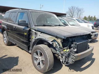 2016 Jeep Patriot High Altitude Edition with VIN 1C4NJRFB7GD596890, listed as a IAAI auction lot 41754038 with 99,971 mi miles. Bid and sale history available at carsss.com. Image 1.