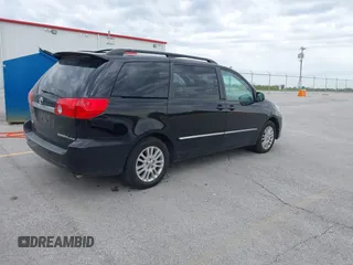 2008 Toyota Sienna XLE with VIN 5TDZK22C18S161342, listed as a IAAI auction lot 42027277 with 198,489 mi miles. Bid and sale history available at carsss.com. Image 4.