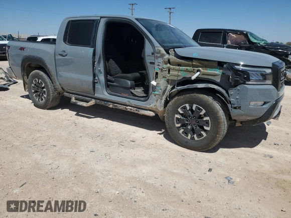 2024 Nissan Frontier PRO-4X with VIN 1N6ED1EK9RN600720, listed as a Copart auction lot 67608184 with 23,662 mi miles and Salvage Title. Bid and sale history available at carsss.com. Image 4.