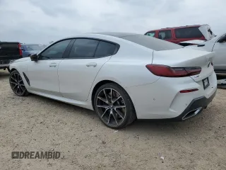 2023 BMW 8 Series M850i z VIN WBAGV8C01PCK29190, wystawiony jako Copart lot #47189205 z przebiegiem 32 691 mil mil oraz Szkoda całkowita • Salvage title. Historia ofert i sprzedaży dostępna na DreamBid. Obrazek 2.