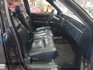 1989 Cadillac DeVille z VIN 1G6CD5159K4356924, wystawiony jako IAAI lot #41526057 z przebiegiem 148 134 mil mil oraz . Historia ofert i sprzedaży dostępna na DreamBid. Obrazek 5.
