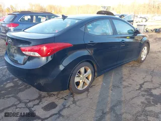 2012 Hyundai Elantra GLS with VIN KMHDH4AE8CU254219, listed as a IAAI auction lot 41206192 with 210,817 mi miles. Bid and sale history available at carsss.com. Image 4.