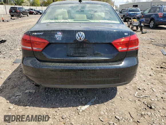 2012 Volkswagen Passat SE z VIN 1VWBP7A30CC071883, wystawiony jako Copart lot #53976725 z przebiegiem 206 180 mil mil oraz Szkoda całkowita • Salvage title. Historia ofert i sprzedaży dostępna na DreamBid. Obrazek 6.