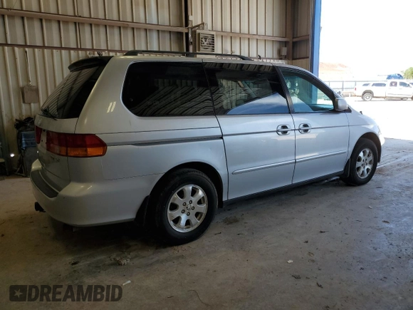 2002 Honda Odyssey EX z VIN 5FNRL18622B049511, wystawiony jako Copart lot #55265485 z przebiegiem 208 693 mil mil oraz Czysty tytuł • Clean title. Historia ofert i sprzedaży dostępna na DreamBid. Obrazek 3.