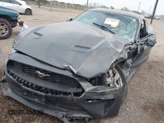 2018 Ford Mustang EcoBoost with VIN 1FA6P8TH3J5146392, listed as a IAAI auction lot 41780815 with 70,992 mi miles and . Bid and sale history available at carsss.com. Image 2.