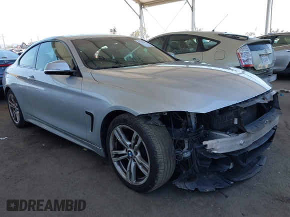 2014 BMW 4 Series 428i with VIN WBA3N7C58EF719514, listed as a IAAI auction lot 42310537 with 82,573 mi miles and . Bid and sale history available at DreamBid. Image 1.