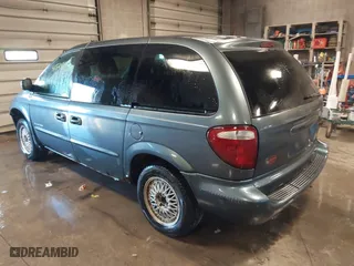 2001 Dodge Caravan Sport with VIN 1B4GP45321B213085, listed as a IAAI auction lot 41529881 with 124,818 mi miles. Bid and sale history available at carsss.com. Image 3.
