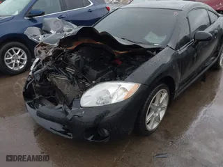 2007 Mitsubishi Eclipse SE with VIN 4A3AK64F77E072243, listed as a IAAI auction lot 41656069 with 164,174 mi miles. Bid and sale history available at carsss.com. Image 6.