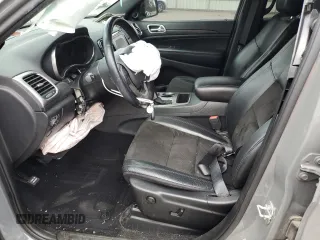 2020 Jeep Grand Cherokee Laredo E with VIN 1C4RJEAG0LC404979, listed as a Copart auction lot 81999474 with 57,328 mi miles and Salvage title. Bid and sale history available at DreamBid. Image 7.