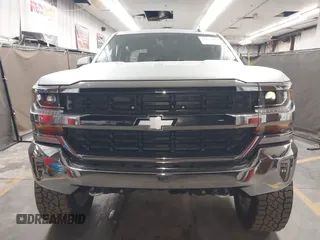 2018 Chevrolet Silverado 1500 LT with VIN 1GCVKREC1JZ151188, listed as a IAAI auction lot 42153618 with 82,391 mi miles and . Bid and sale history available at DreamBid. Image 13.