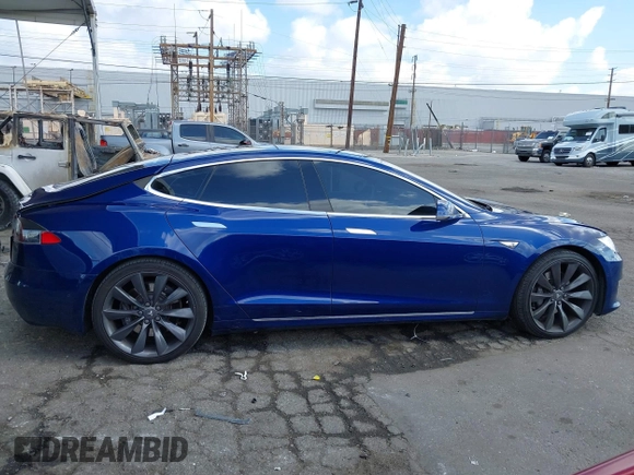 2016 Tesla Model S 90D with VIN 5YJSA1E22GF154873, listed as a IAAI auction lot 41950274 with 82,649 mi miles and . Bid and sale history available at DreamBid. Image 13.