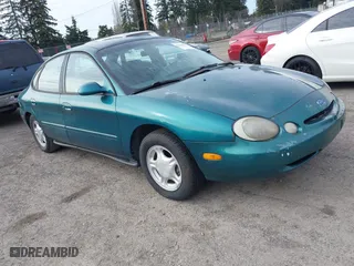1997 Ford Taurus GL with VIN 1FALP52U4VG276207, listed as a IAAI auction lot 41664936 with 138,398 mi miles. Bid and sale history available at carsss.com. Image 1.