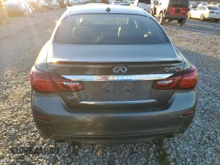 2015 Infiniti Q70 z VIN JN1BY1PR2FM830124, wystawiony jako Copart lot #42536205 z przebiegiem 138 498 mil mil oraz Szkoda całkowita • Salvage title. Historia ofert i sprzedaży dostępna na DreamBid. Obrazek 6.