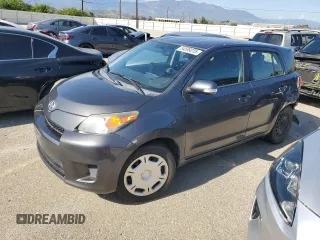 2014 Scion xD with VIN JTKKUPB41E1046114, listed as a Copart auction lot 54599235 with 125,979 mi miles and Salvage title. Bid and sale history available at DreamBid. Image 1.