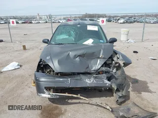 2004 Ford Focus ZTS with VIN 1FAFP38Z94W165483, listed as a IAAI auction lot 41775001 with 222,589 mi miles and . Bid and sale history available at carsss.com. Image 12.