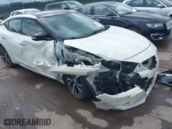 2018 Nissan Maxima SL with VIN 1N4AA6AP2JC395188, listed as a IAAI auction lot 42540832 with 106,898 mi miles and . Bid and sale history available at DreamBid. Image 6.