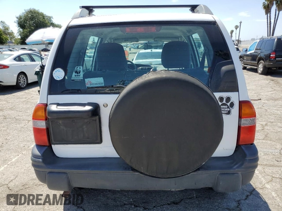2001 Chevrolet Tracker ZR2 z VIN 2CNBJ734816935414, wystawiony jako Copart lot #54877235 z przebiegiem 117 483 mil mil oraz Szkoda całkowita • Salvage title. Historia ofert i sprzedaży dostępna na DreamBid. Obrazek 6.