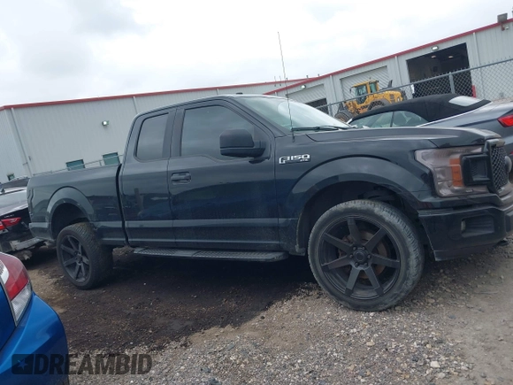 2018 Ford F-150 XL with VIN 1FTEX1EP1JKC22405, listed as a IAAI auction lot 42143837 with 111,597 mi miles and . Bid and sale history available at DreamBid. Image 14.