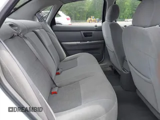 2007 Ford Taurus SE z VIN 1FAFP53U57A101188, wystawiony jako IAAI lot #42102585 z przebiegiem Nie podano mil oraz . Historia ofert i sprzedaży dostępna na DreamBid. Obrazek 8.