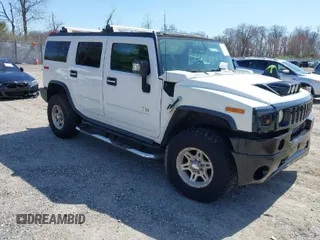 2006 Hummer H2 with VIN 5GRGN23U86H104660, listed as a IAAI auction lot 41933116 with 165,734 mi miles. Bid and sale history available at carsss.com. Image 1.