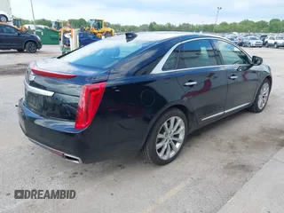 2016 Cadillac XTS Luxury Collection with VIN 2G61N5S31G9186760, listed as a IAAI auction lot 42390091 with 62,689 mi miles and . Bid and sale history available at DreamBid. Image 4.