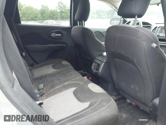 2016 Jeep Cherokee Altitude z VIN 1C4PJMAS0GW251840, wystawiony jako IAAI lot #42636245 z przebiegiem 216 061 mil mil oraz . Historia ofert i sprzedaży dostępna na DreamBid. Obrazek 8.