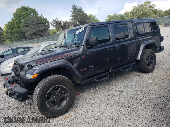 2021 Jeep Gladiator Rubicon with VIN 1C6JJTBG3ML602478, listed as a Copart auction lot 58138705 with 76,759 mi miles and Salvage title. Bid and sale history available at DreamBid. Image 1.