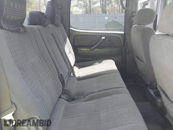2004 Toyota Tundra SR5 with VIN 5TBDT44174S434897, listed as a IAAI auction lot 42128806 with 218,054 mi miles and . Bid and sale history available at DreamBid. Image 8.