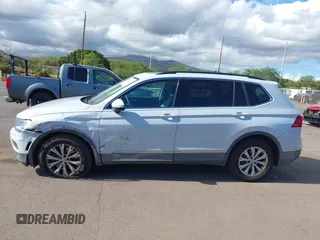 2018 Volkswagen Tiguan SEL z VIN 3VV3B7AX7JM126402, wystawiony jako IAAI lot #42046690 z przebiegiem 54 790 mil mil oraz . Historia ofert i sprzedaży dostępna na DreamBid. Obrazek 14.